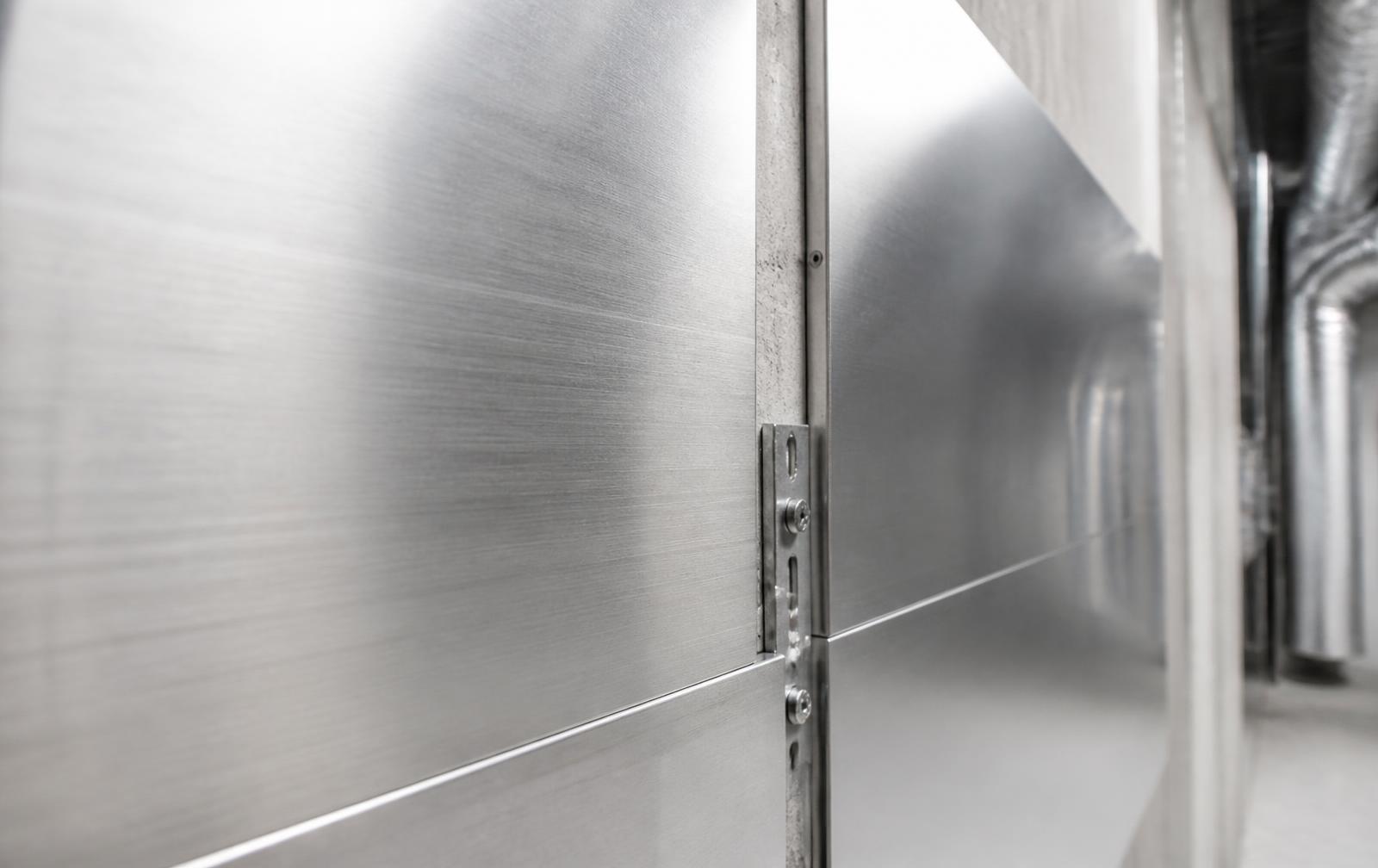 Mu-metal magnetic shielding plates installed on a technical room wall